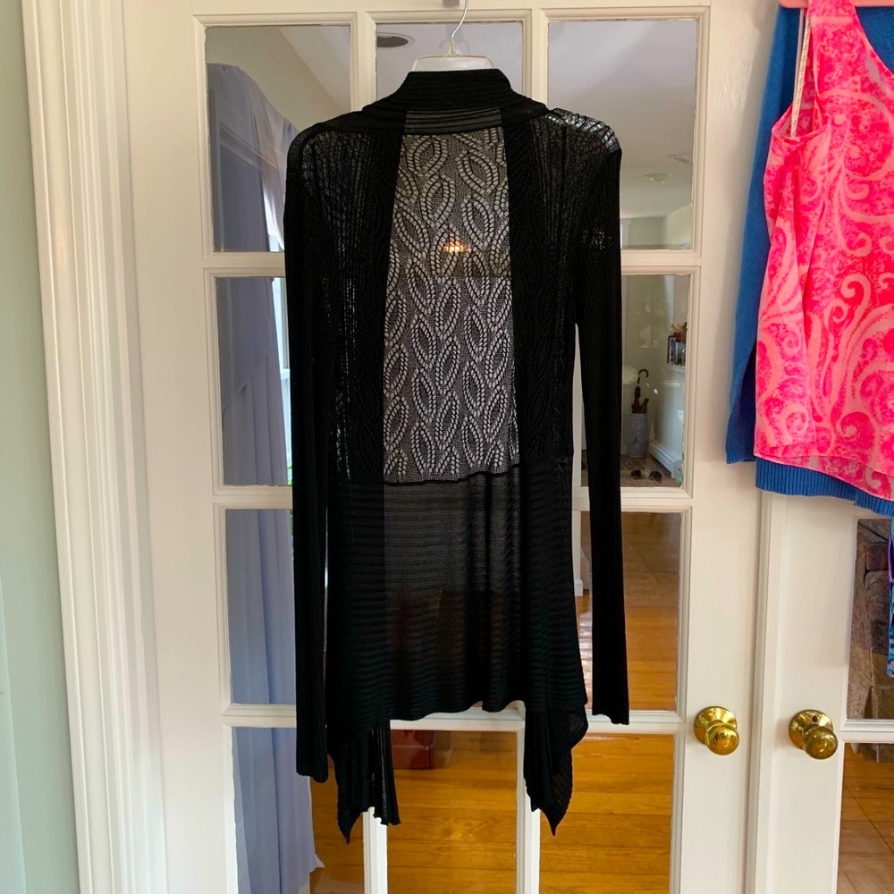 Top your black dress or blouse off with this!